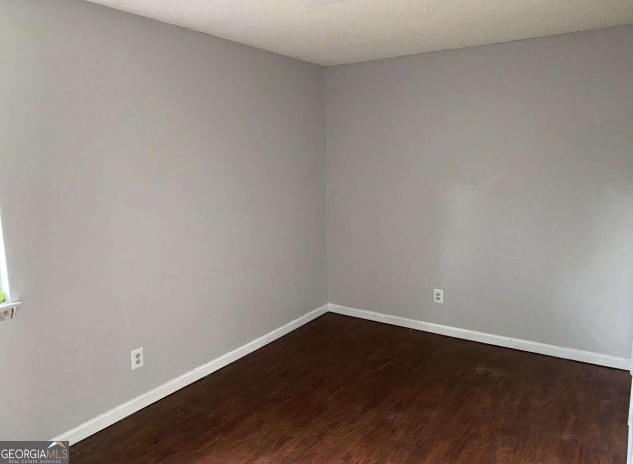 481 Main Street Clermont, GA 30527 - Photo 28 of 43 a view of an empty room with wooden floor