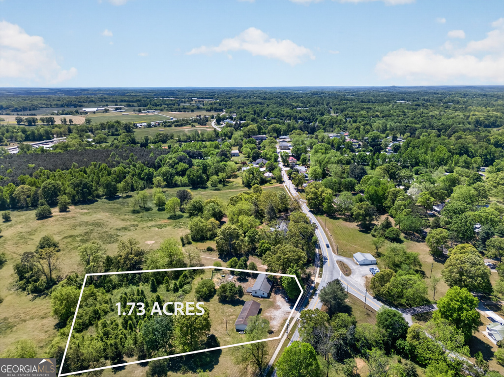 481 Main Street Clermont, GA 30527 - Photo 3 of 43 an aerial view of a city