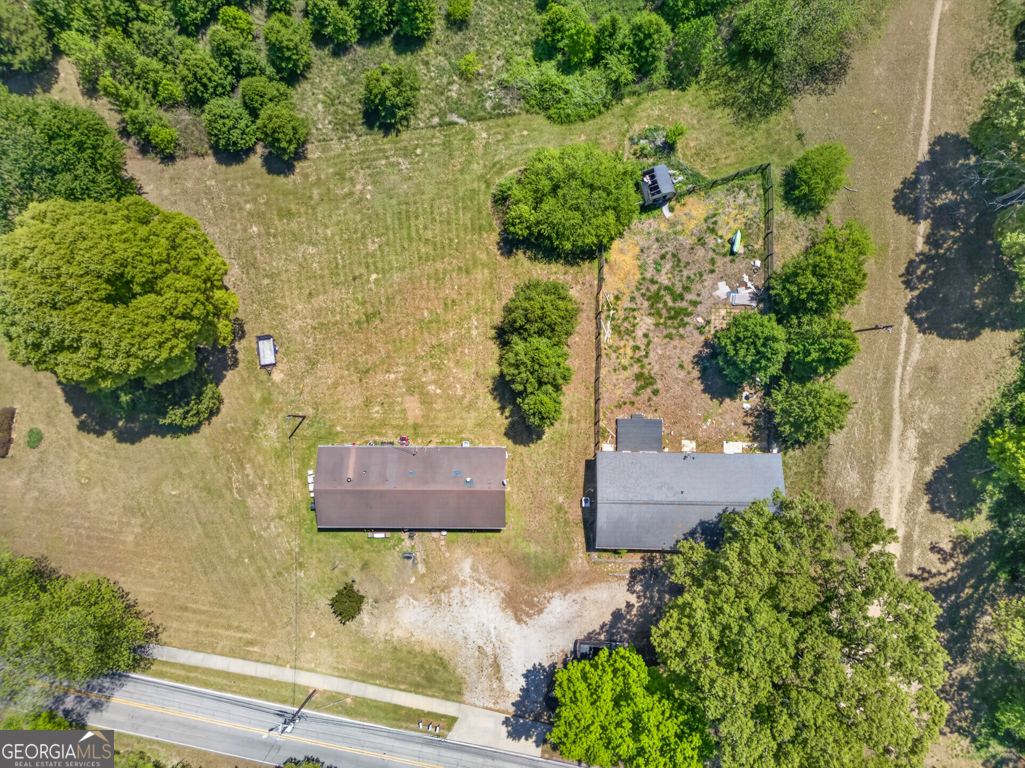 481 Main Street Clermont, GA 30527 - Photo 9 of 43 an aerial view of residential house with outdoor space