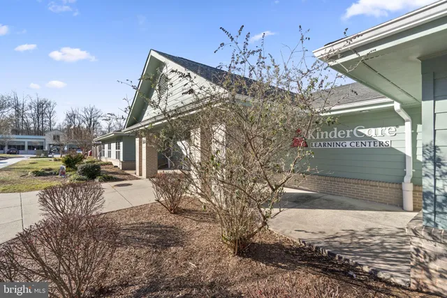 a car parked in front of parking building