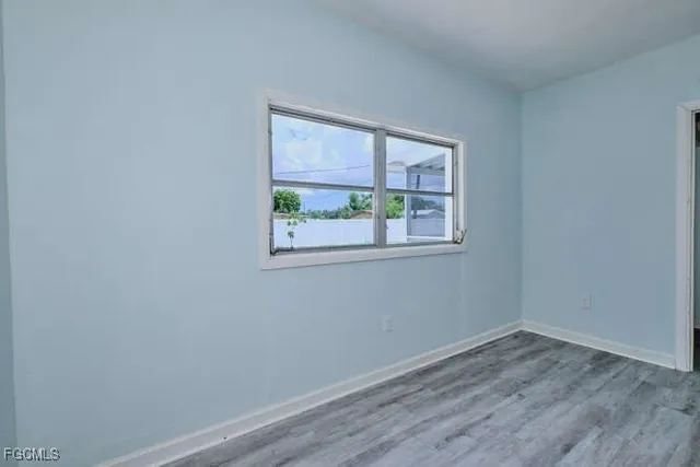 an empty room with a window