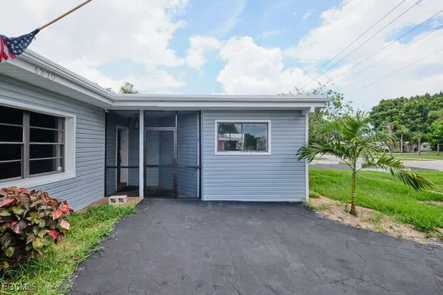 a view of a house with a garden