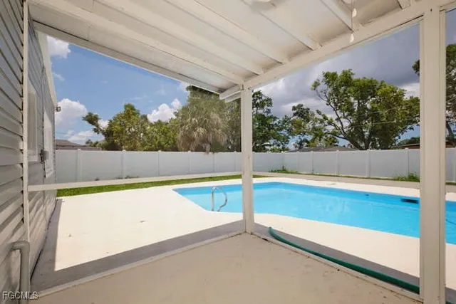 a view of an outdoor space and swimming pool