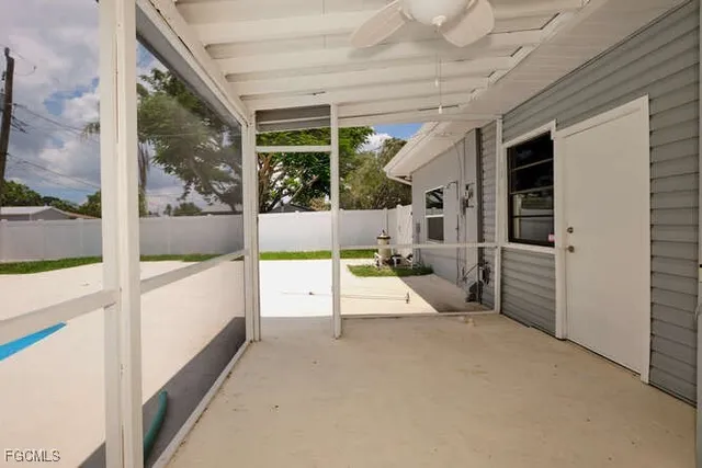 a view of a porch with seating space