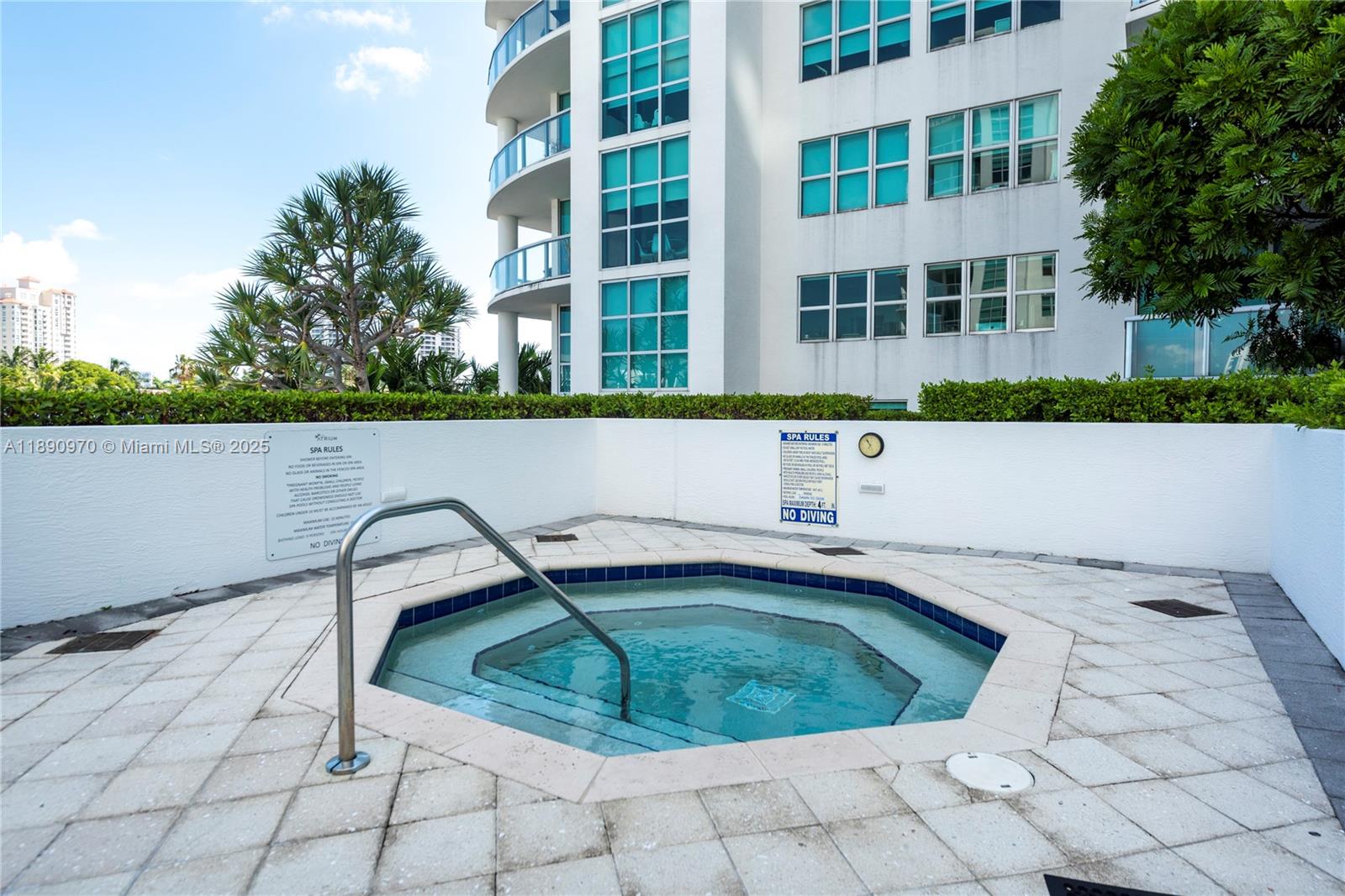 3131 Northeast 188th Street, Unit 2808 Aventura, FL 33180 - Photo 23 of 33 a view of a swimming pool with a chair