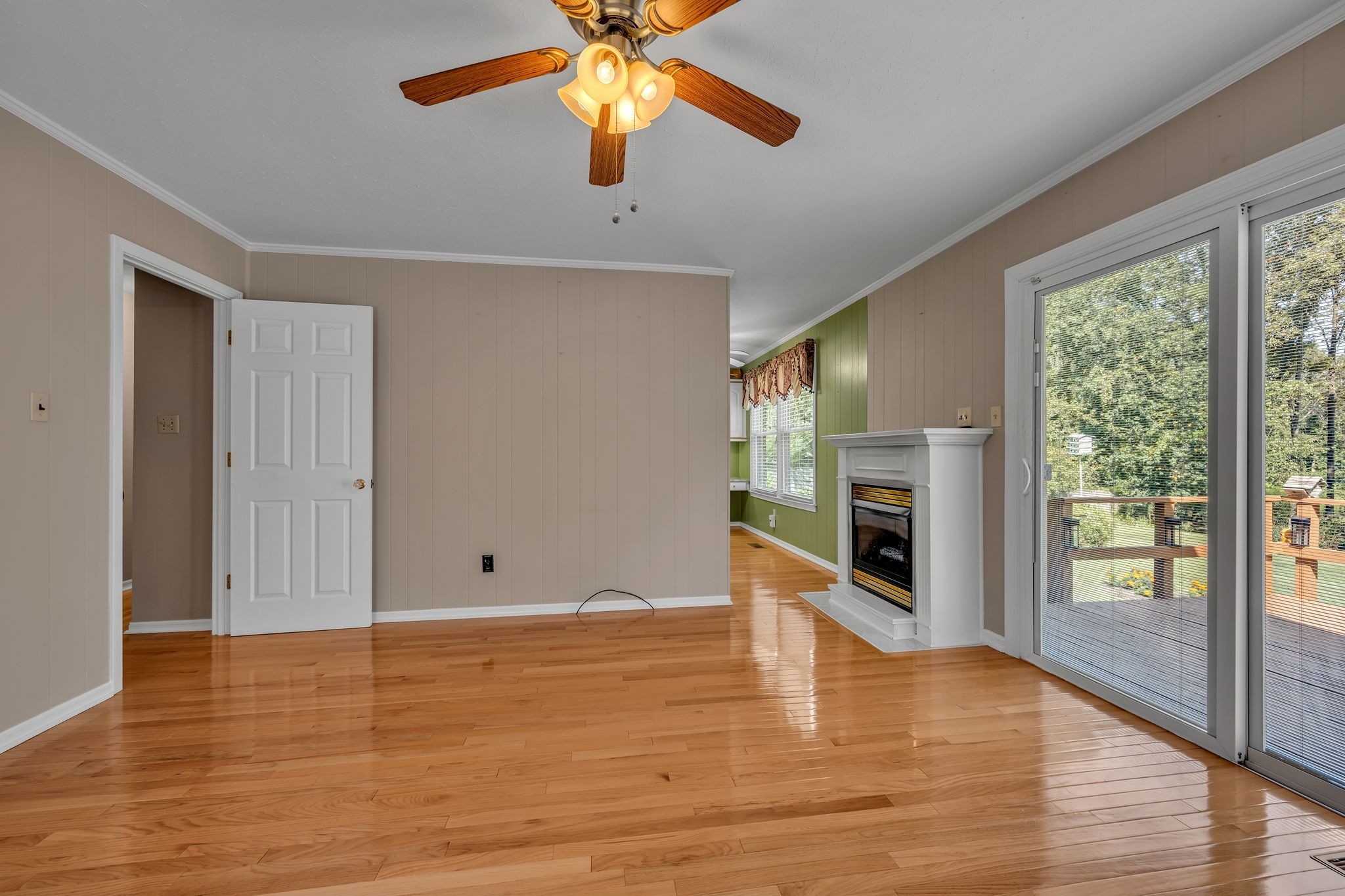 126 Robin Hood Road Dickson, TN 37055 - Photo 23 of 31 a view of an empty room with window and wooden floor