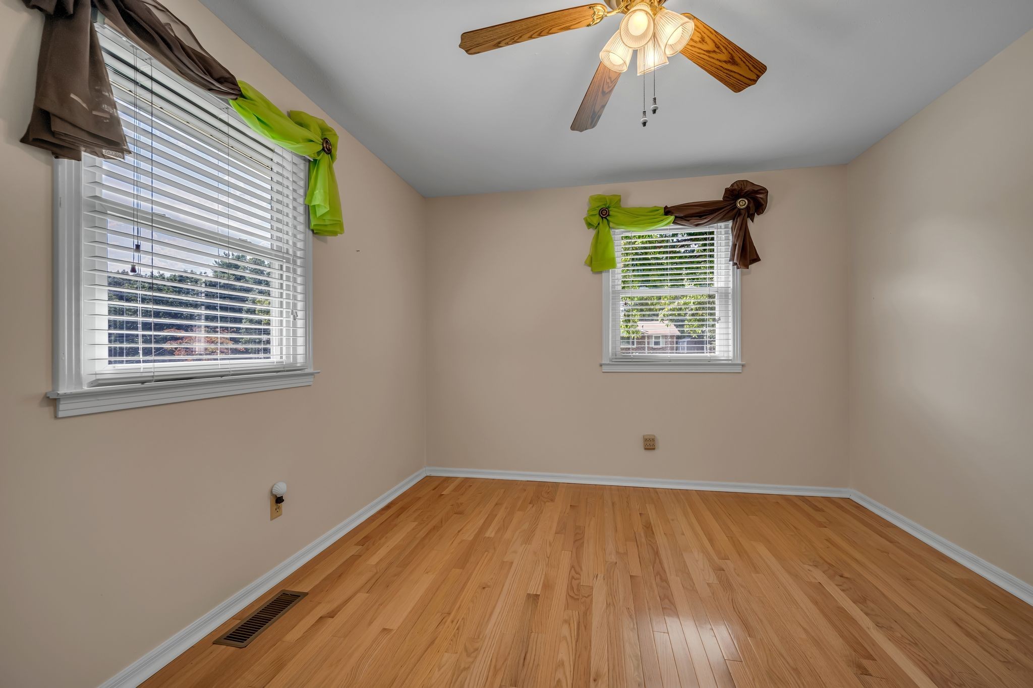 126 Robin Hood Road Dickson, TN 37055 - Photo 27 of 31 a view of empty room with wooden floor and fan
