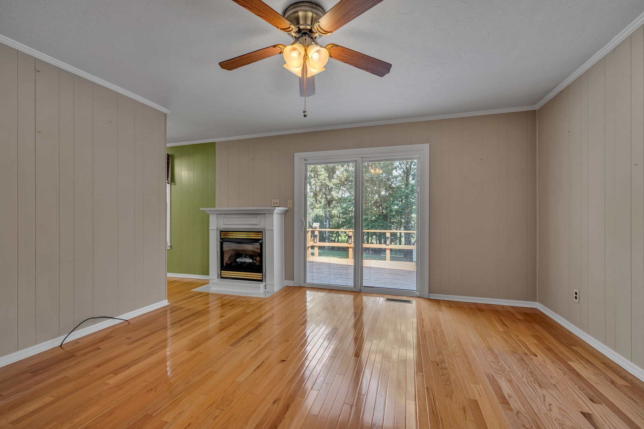 126 Robin Hood Road Dickson, TN 37055 - Photo 10 of 31 wooden floor fireplace and natural light in room