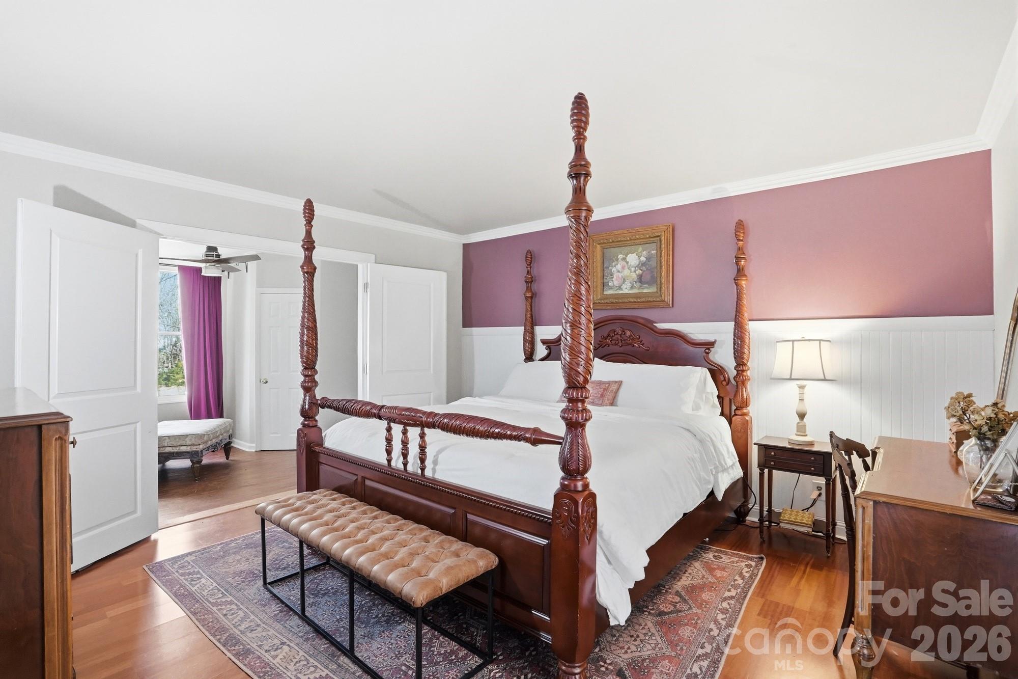 6046 Windjammer Drive Tega Cay, SC 29708 - Photo 22 of 46 a bed room with a bed and a couch