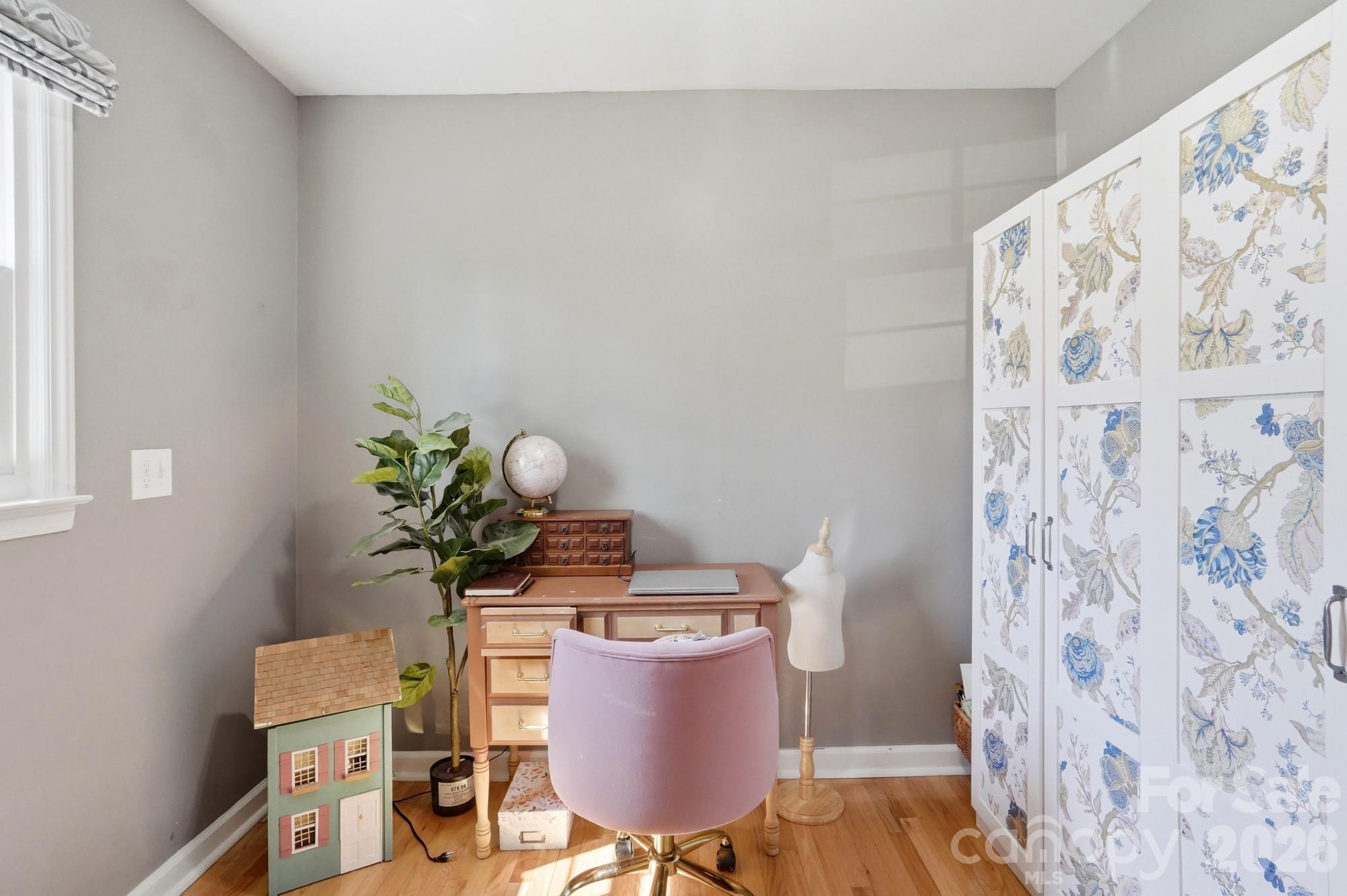 6046 Windjammer Drive Tega Cay, SC 29708 - Photo 31 of 46 a view of a workspace with furniture and a window