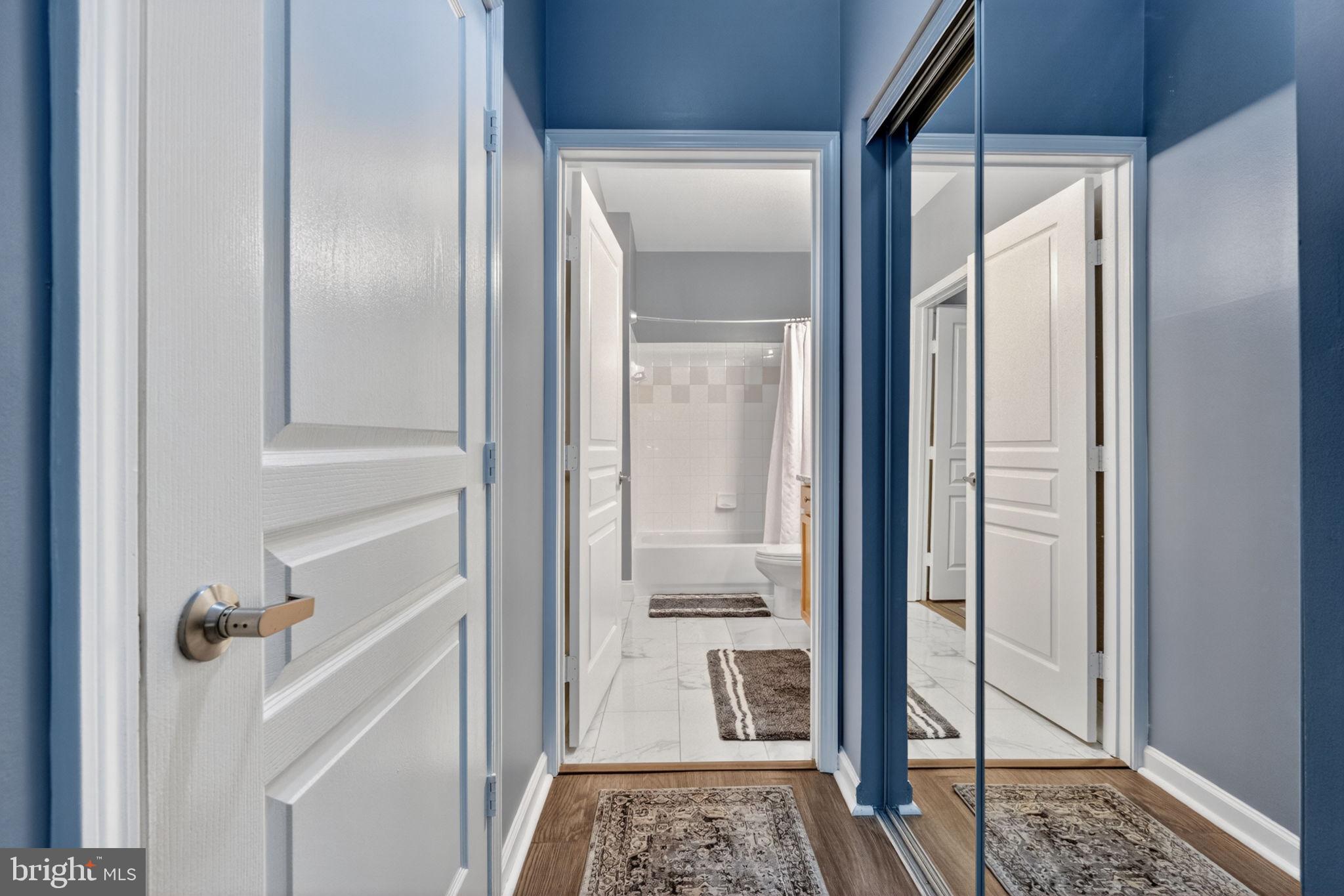 12000 Market Street, Unit 266 Reston, VA 20190 - Photo 19 of 49 Hallway to bathroom