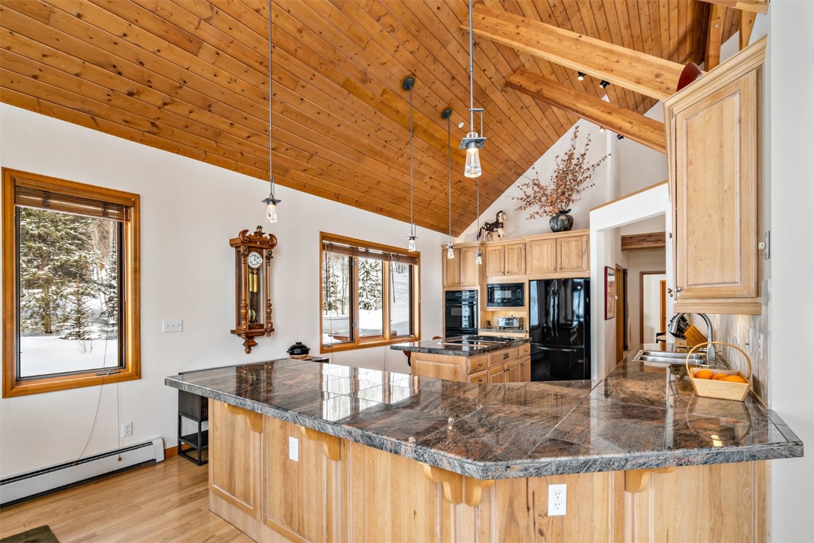 40 Nordic Trail Silverthorne, CO 80498 - Photo 11 of 35 a kitchen with stainless steel appliances granite countertop a sink window and cabinets