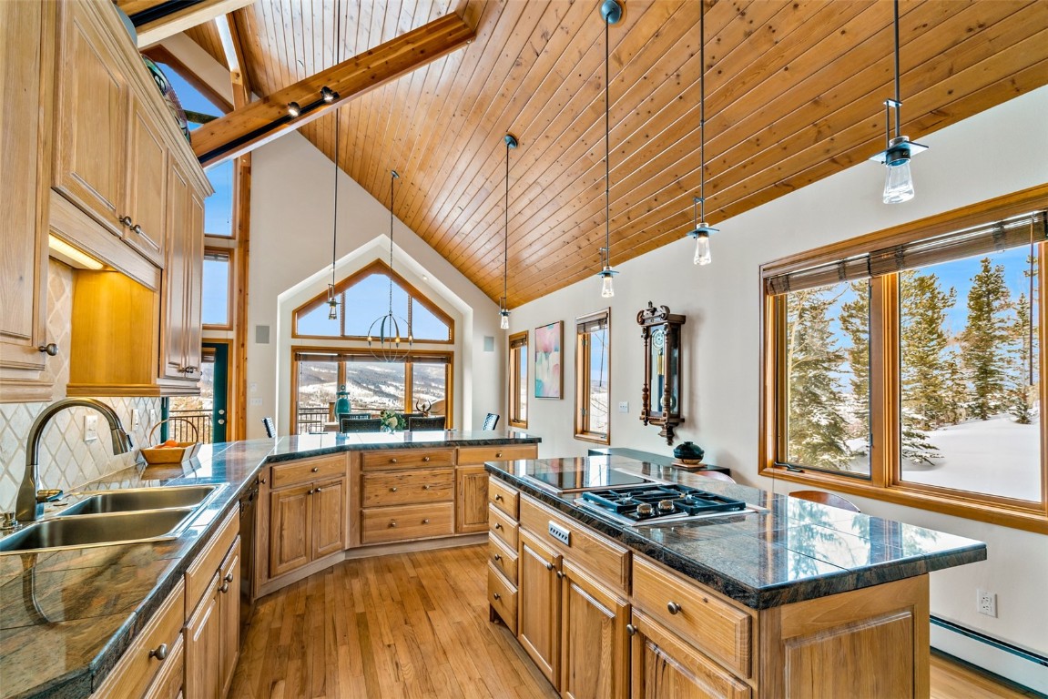 40 Nordic Trail Silverthorne, CO 80498 - Photo 12 of 35 a kitchen with stainless steel appliances granite countertop a sink stove and cabinets