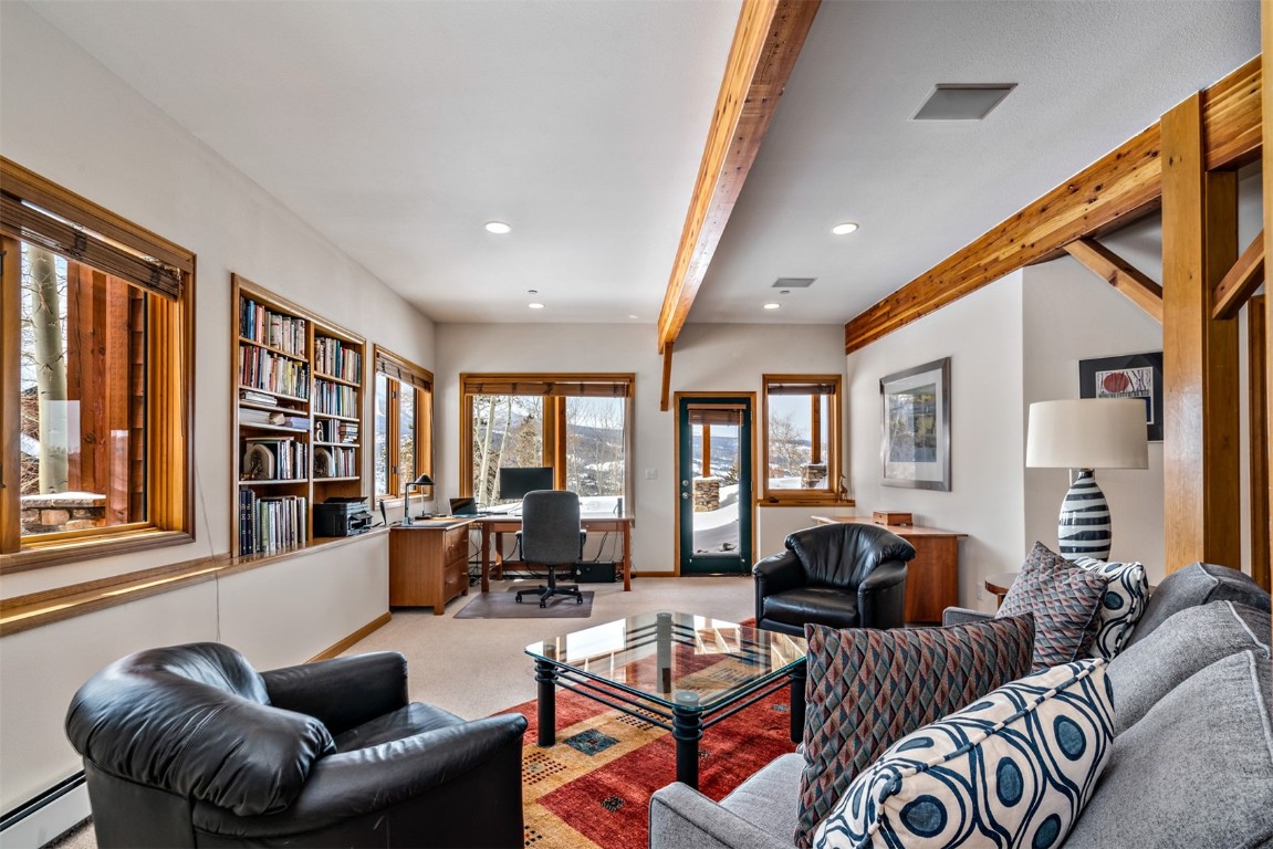 40 Nordic Trail Silverthorne, CO 80498 - Photo 26 of 35 a living room with furniture or couch and a large window