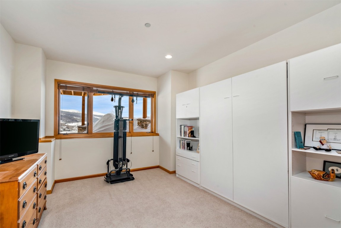 40 Nordic Trail Silverthorne, CO 80498 - Photo 30 of 35 a room with furniture and a flat screen tv