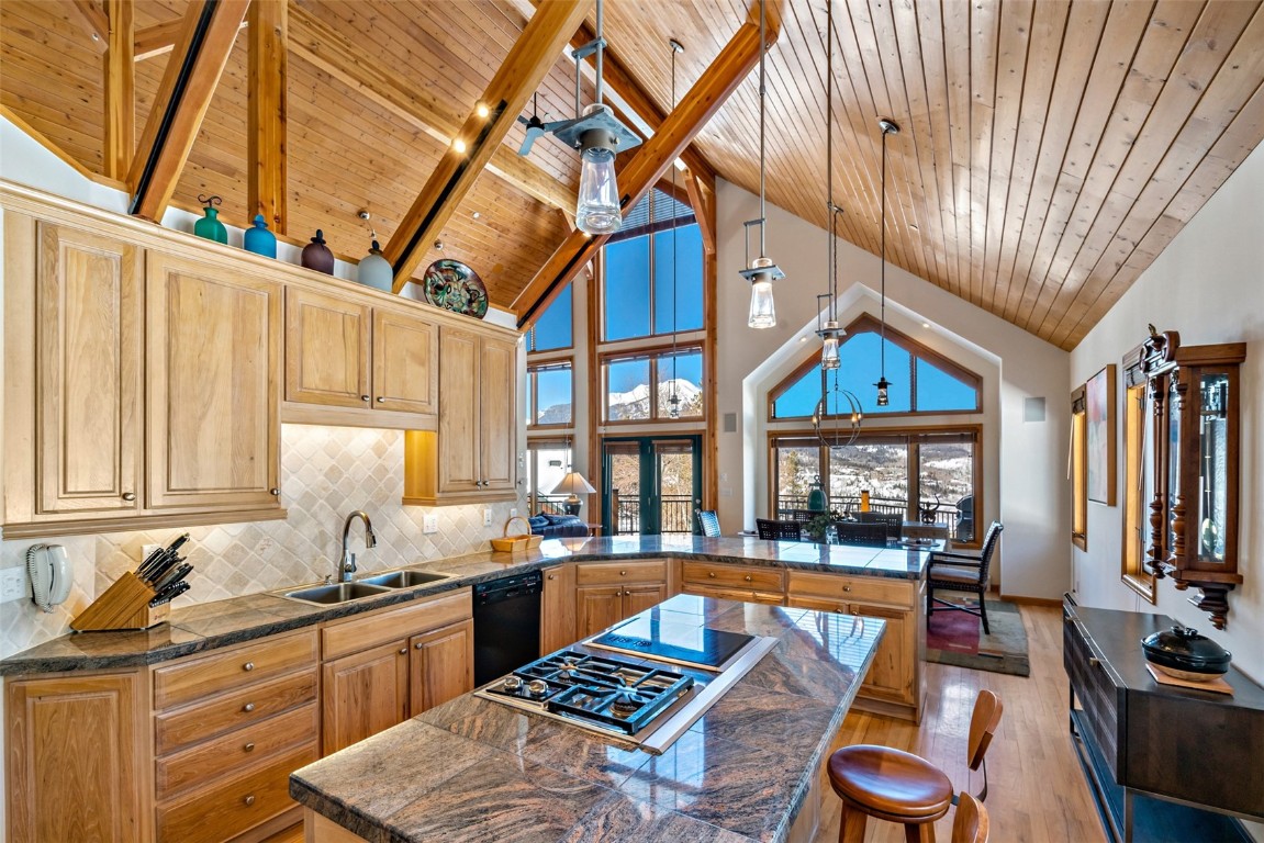 40 Nordic Trail Silverthorne, CO 80498 - Photo 8 of 35 a kitchen with stainless steel appliances granite countertop a stove a sink dishwasher and cabinets