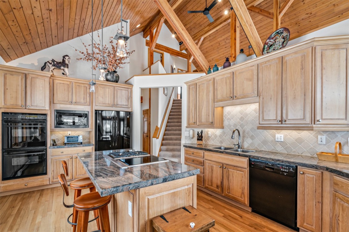 40 Nordic Trail Silverthorne, CO 80498 - Photo 10 of 35 a kitchen with granite countertop a sink a counter space appliances and cabinets