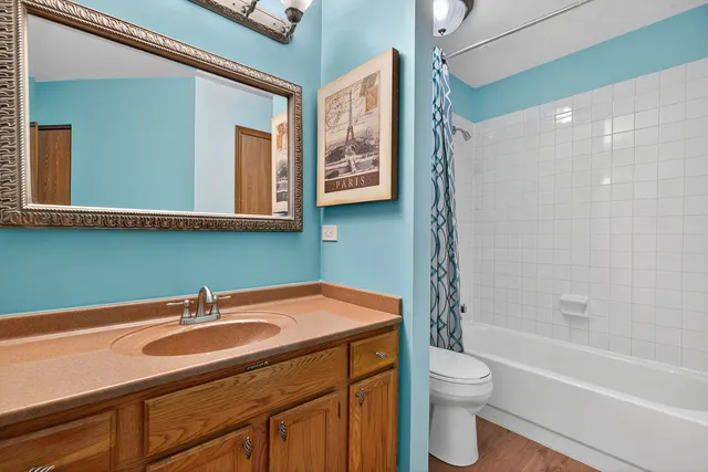 a bathroom with a sink and mirror