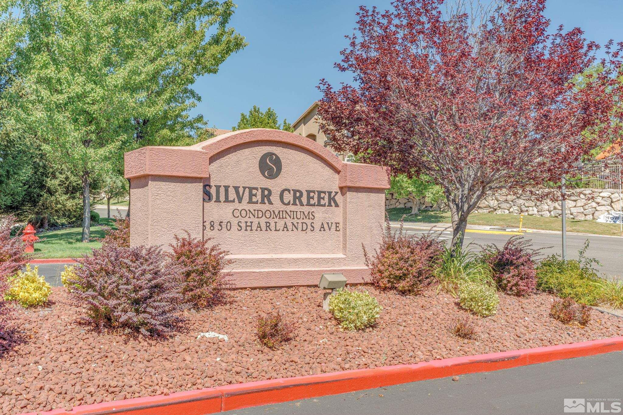 6850 Sharlands Avenue, Unit S2106 Reno, NV 89523 - Photo 1 of 36 a sign on the side of the road