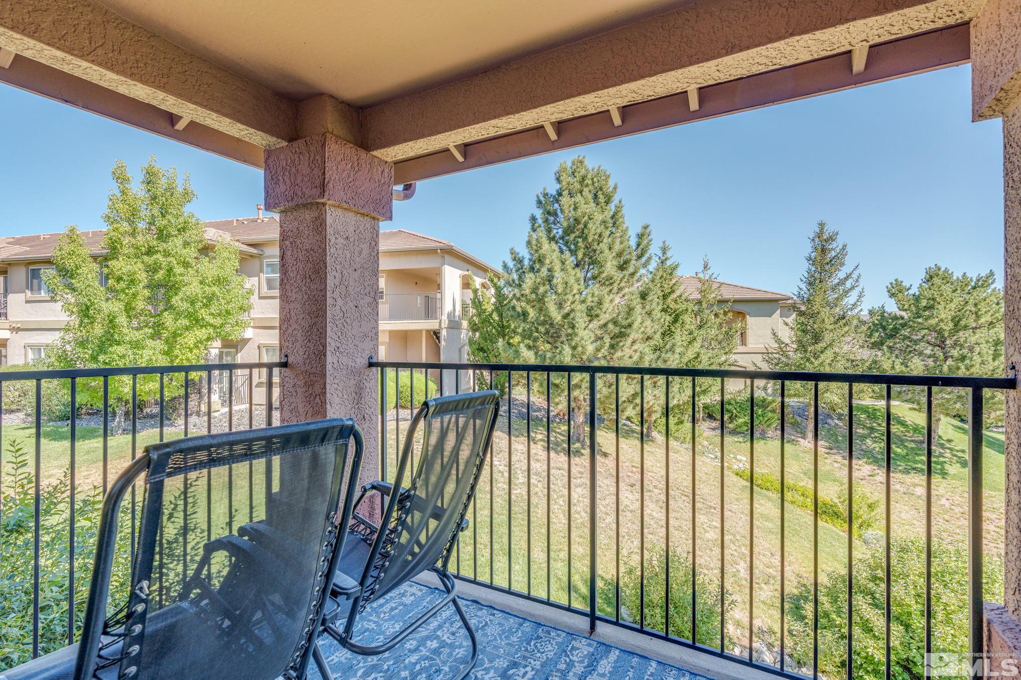 6850 Sharlands Avenue, Unit S2106 Reno, NV 89523 - Photo 19 of 36 a view of balcony with wooden floor
