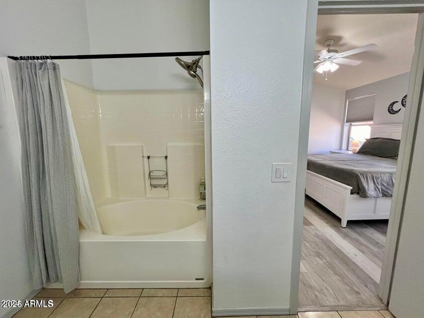 3410 East Escuda Road Phoenix, AZ 85050 - Photo 25 of 43 a en suite bathroom with a tub and shower