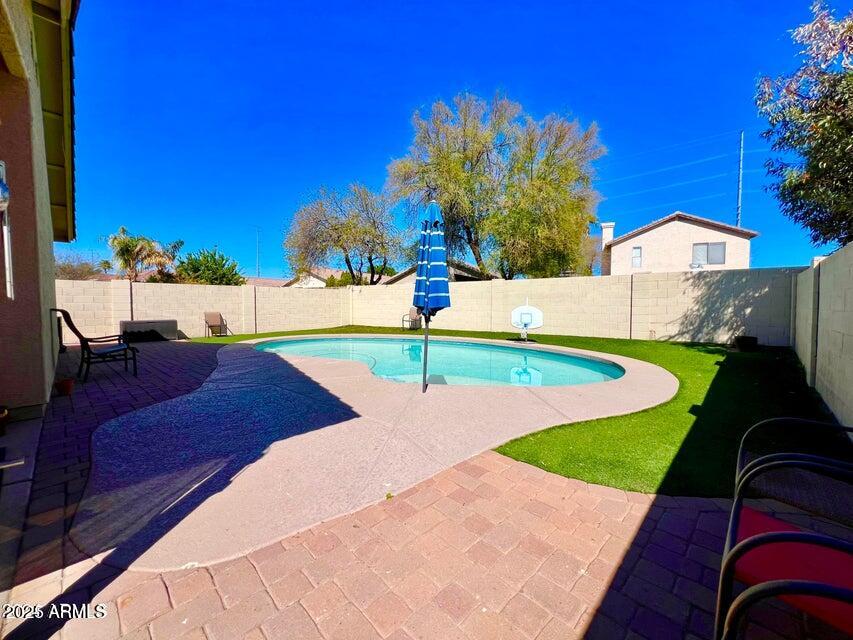 3410 East Escuda Road Phoenix, AZ 85050 - Photo 34 of 43 a view of a backyard