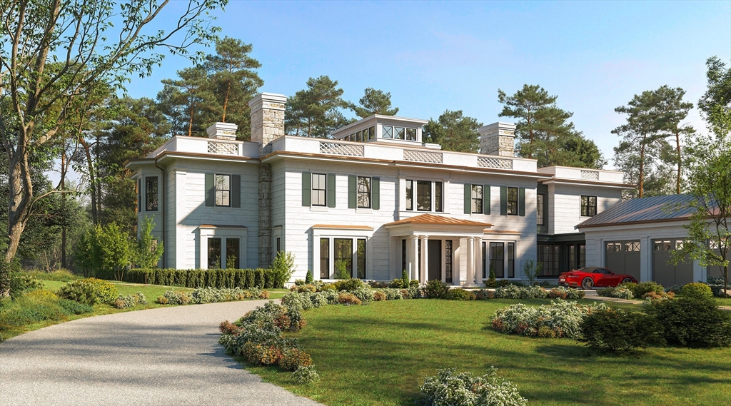 a front view of a house with yard and trees