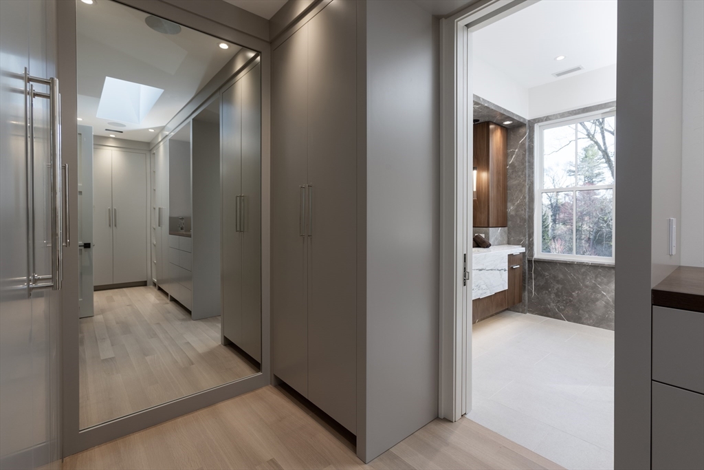 21 Chestnut Street Weston, MA 02493 - Photo 19 of 34 a view of a bathroom from a hallway