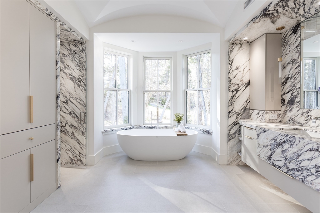 21 Chestnut Street Weston, MA 02493 - Photo 22 of 34 a spacious bathroom with a bathtub and window