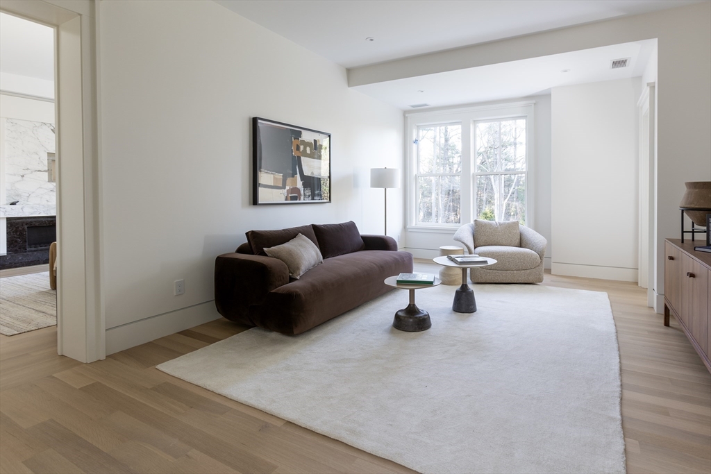 21 Chestnut Street Weston, MA 02493 - Photo 25 of 34 a living room with furniture and a large window