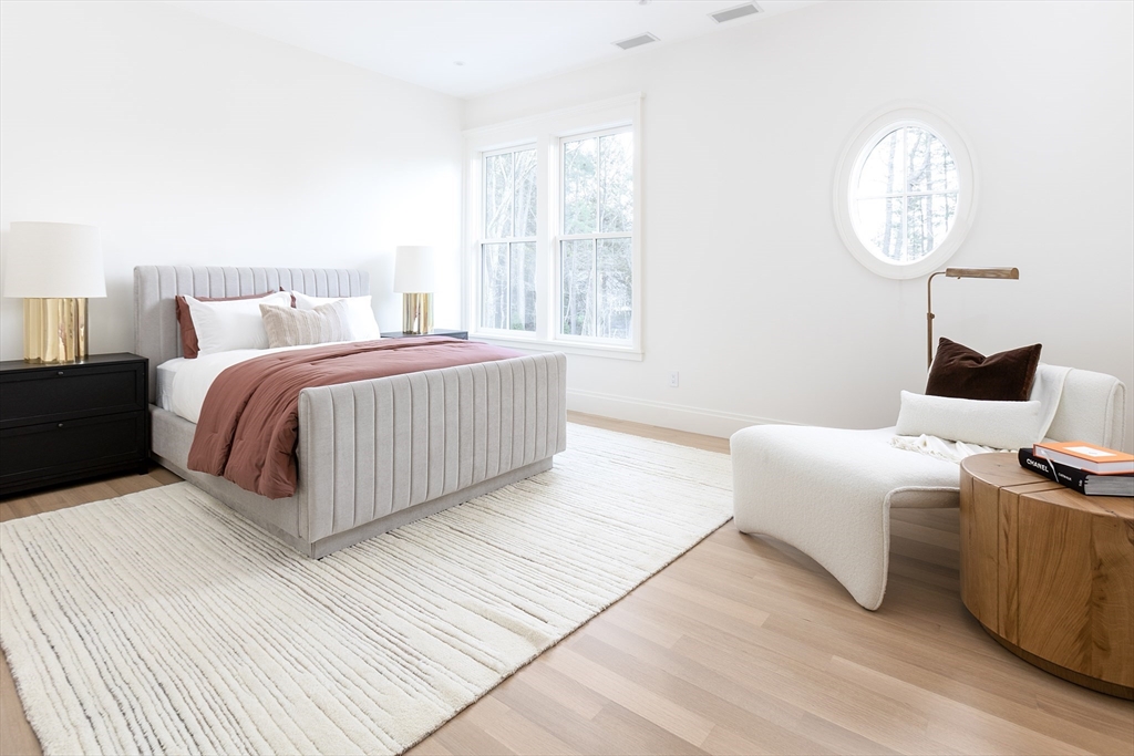 21 Chestnut Street Weston, MA 02493 - Photo 30 of 34 a bedroom with bed and a window