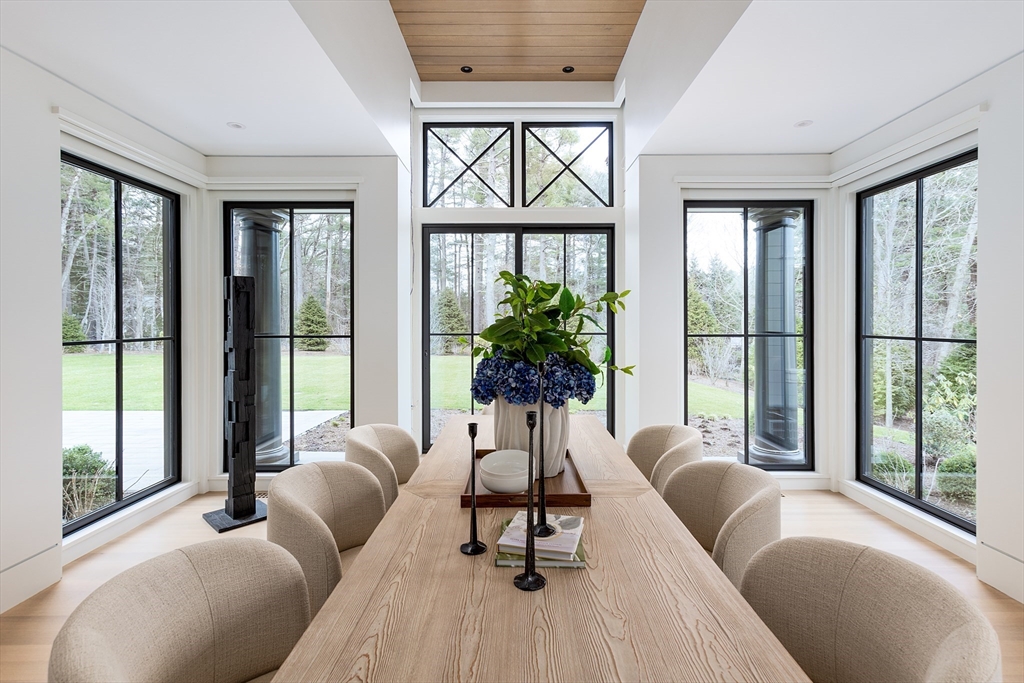 21 Chestnut Street Weston, MA 02493 - Photo 6 of 34 a living room with furniture and a large window