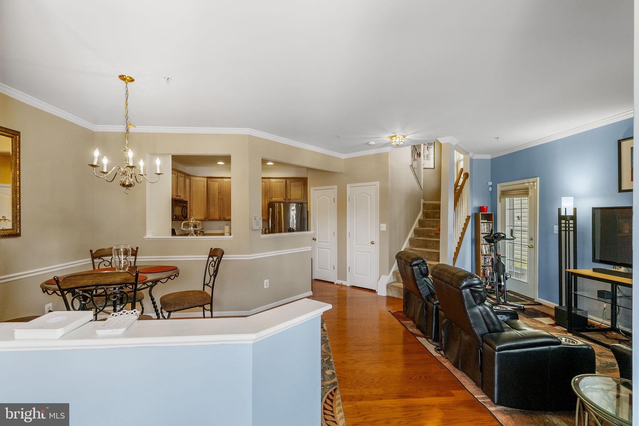 127 Mountain Creek Circle Frederick, MD 21702 - Photo 13 of 26 a living room with furniture flat screen tv and couches