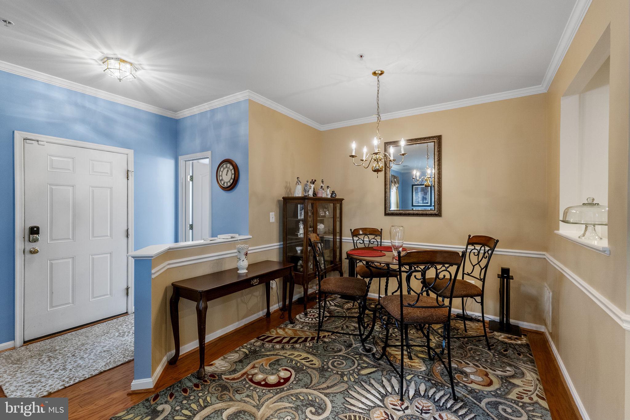 127 Mountain Creek Circle Frederick, MD 21702 - Photo 14 of 26 a view of a dining room with furniture