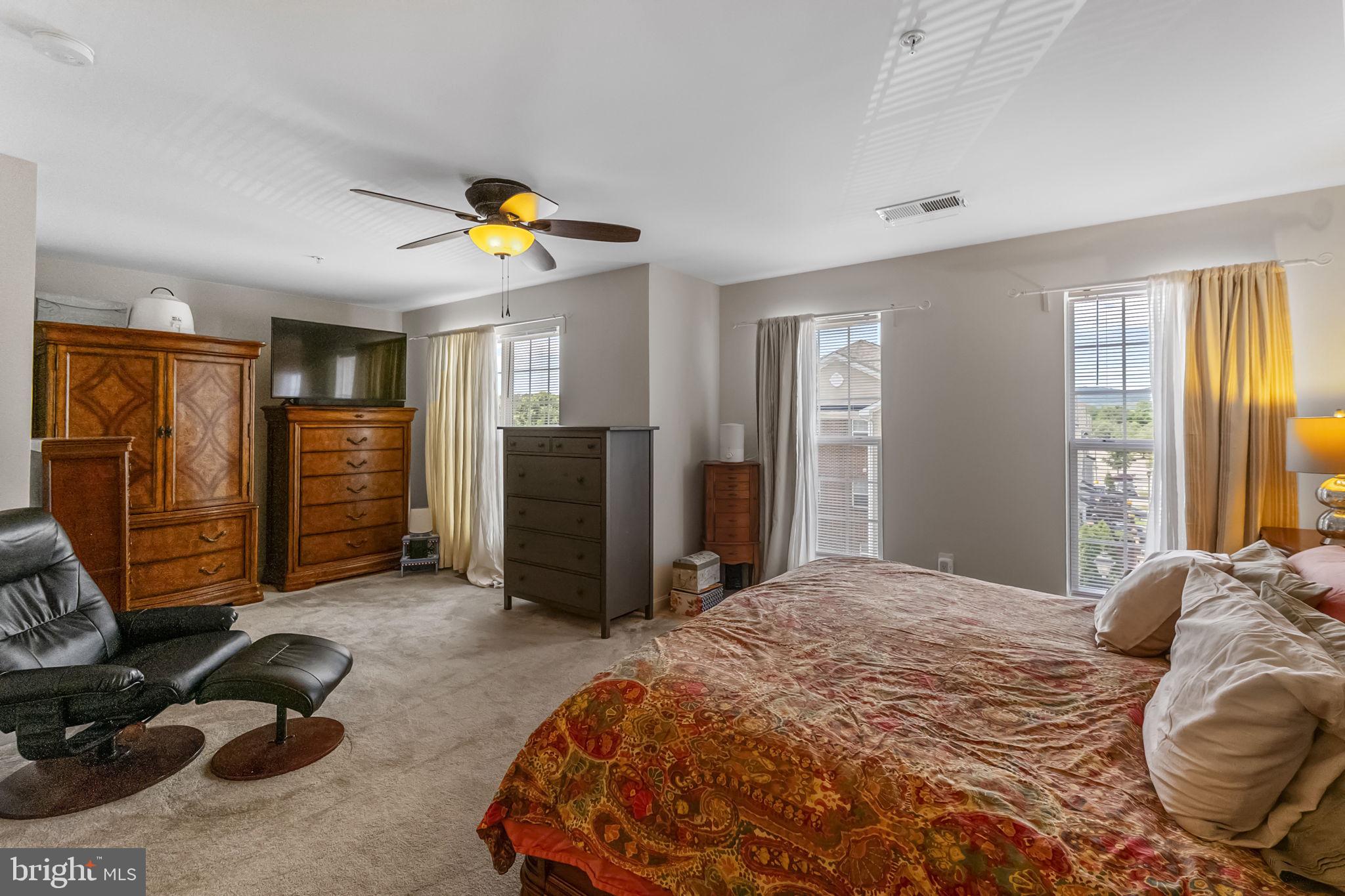 127 Mountain Creek Circle Frederick, MD 21702 - Photo 19 of 26 a bedroom with a bed and furniture