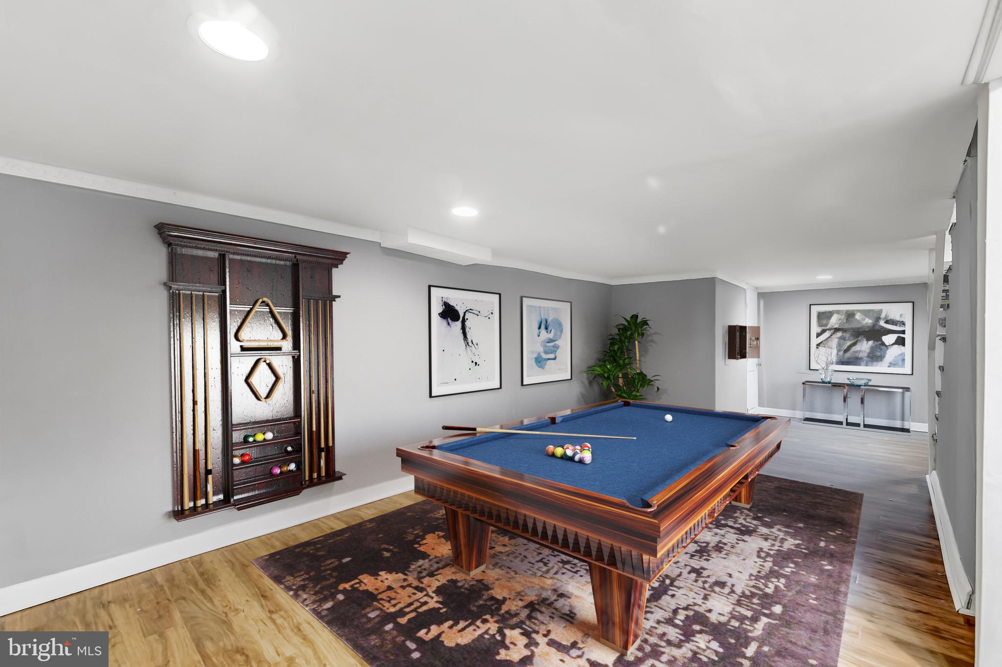 3708 Woodridge Road Baltimore, MD 21229 - Photo 26 of 41 Large man cave with padded engineered flooring.
