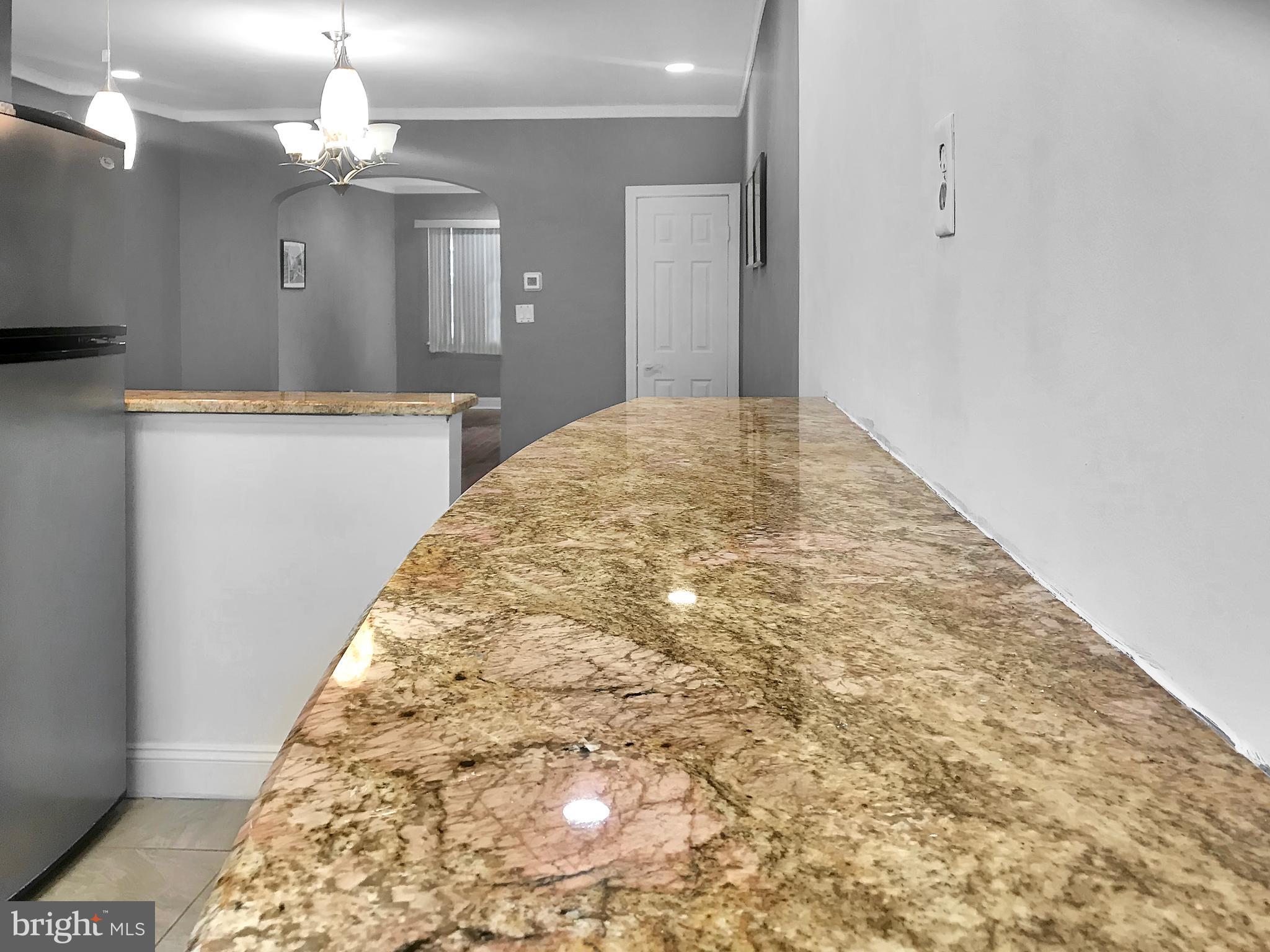 Wide counter allows for in kitchen dining.