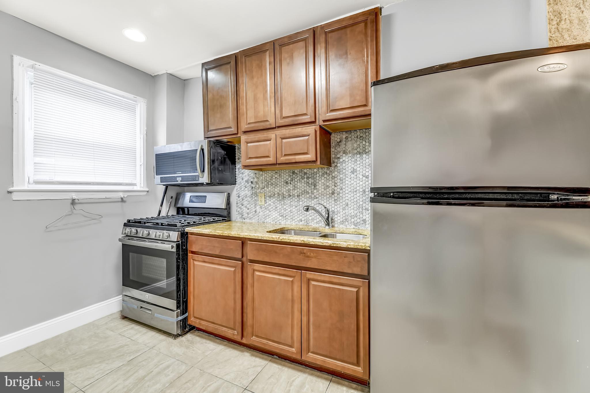 3708 Woodridge Road Baltimore, MD 21229 - Photo 9 of 41 Don't miss the marble floors.