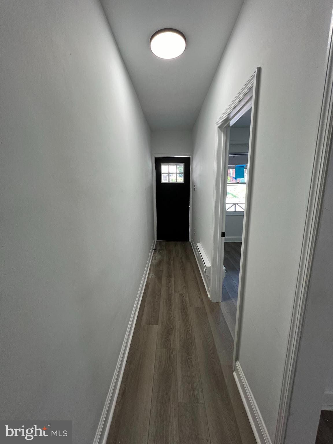 921 West 3rd Street Chester, PA 19013 - Photo 12 of 18 a view of a hallway with wooden floor