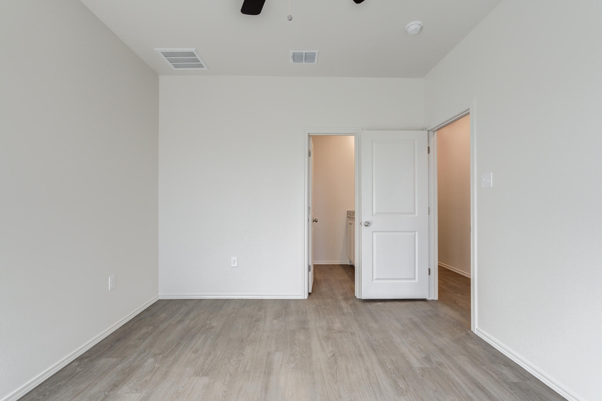 7007 40th Street Lubbock, TX 79407 - Photo 22 of 30 an empty room with wooden floor