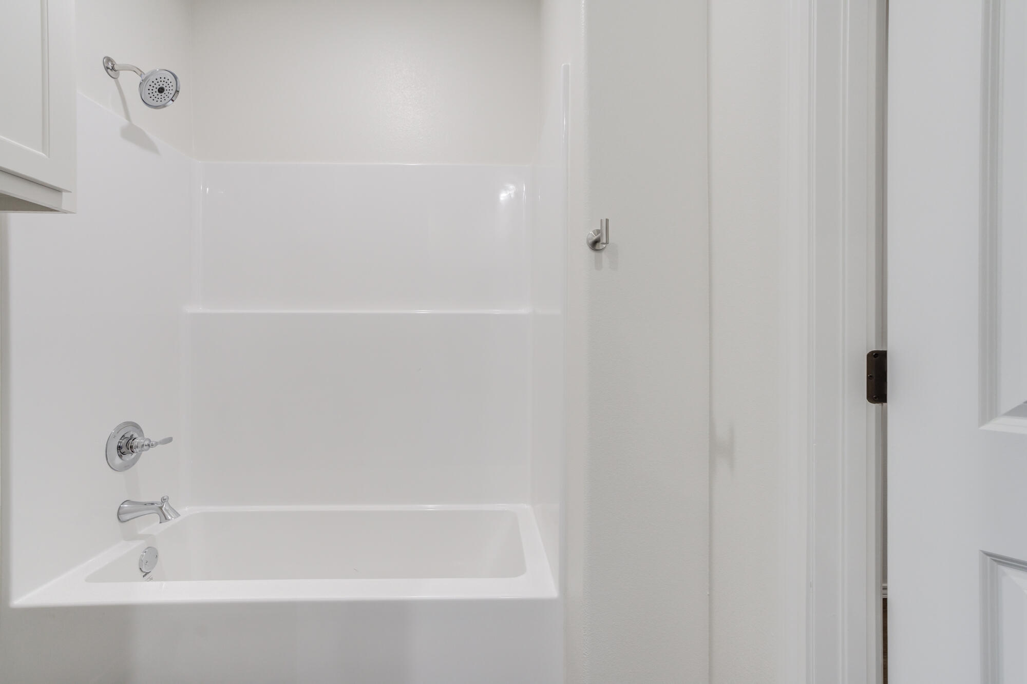 7007 40th Street Lubbock, TX 79407 - Photo 24 of 30 a bathroom with bathtub