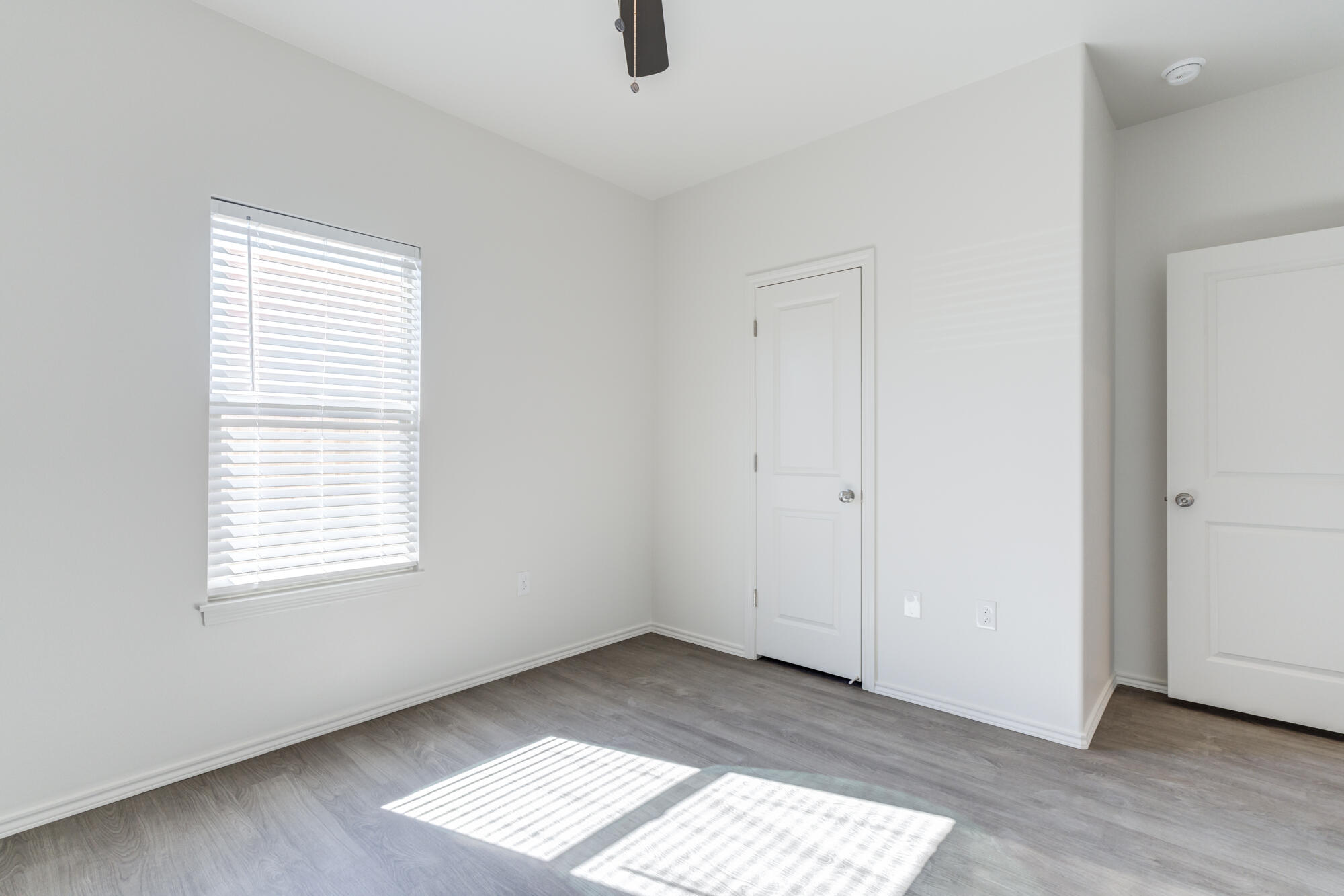 7007 40th Street Lubbock, TX 79407 - Photo 27 of 30 an empty room with windows