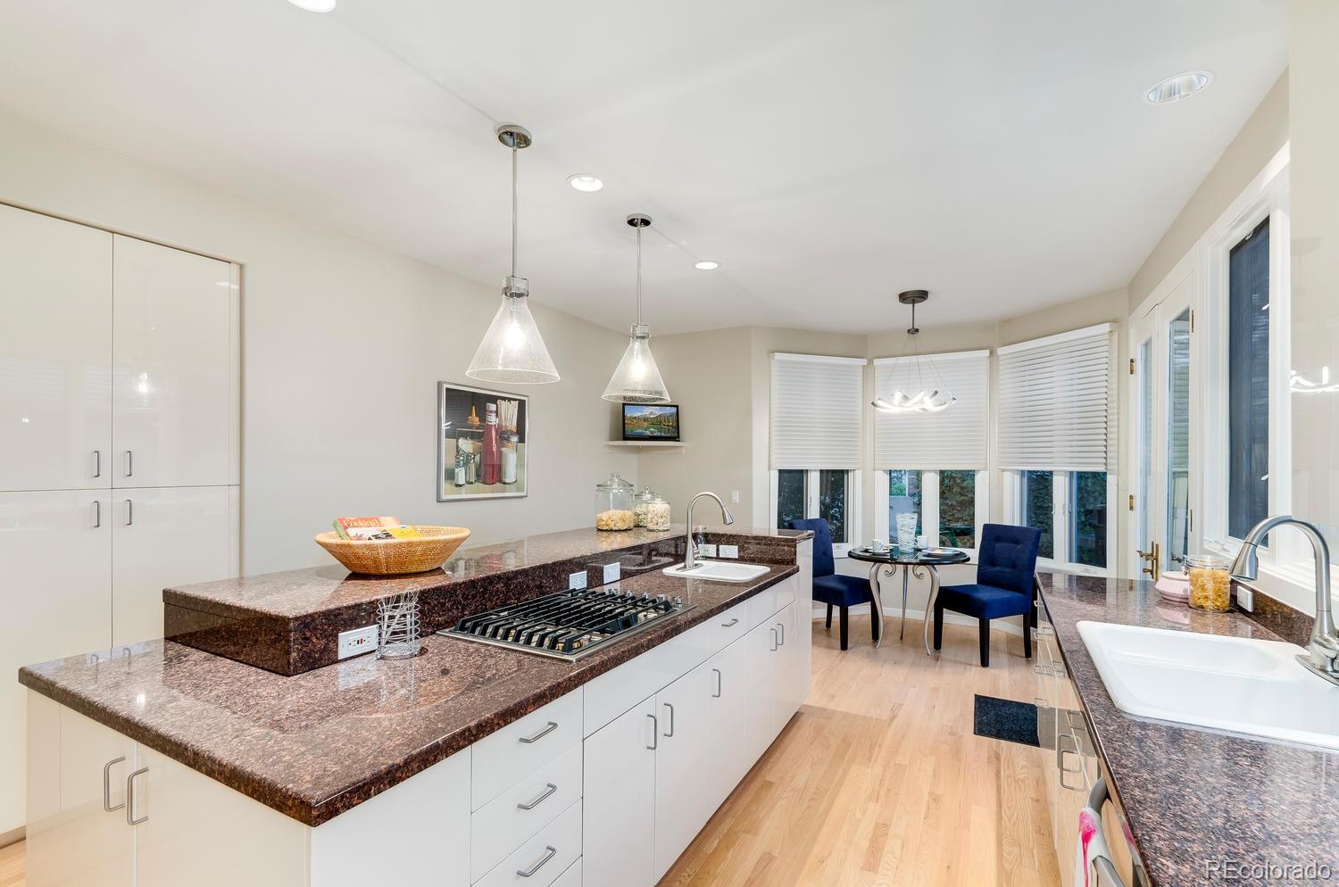 27 Hyde Park Circle Denver, CO 80209 - Photo 12 of 40 a large kitchen with counter space
