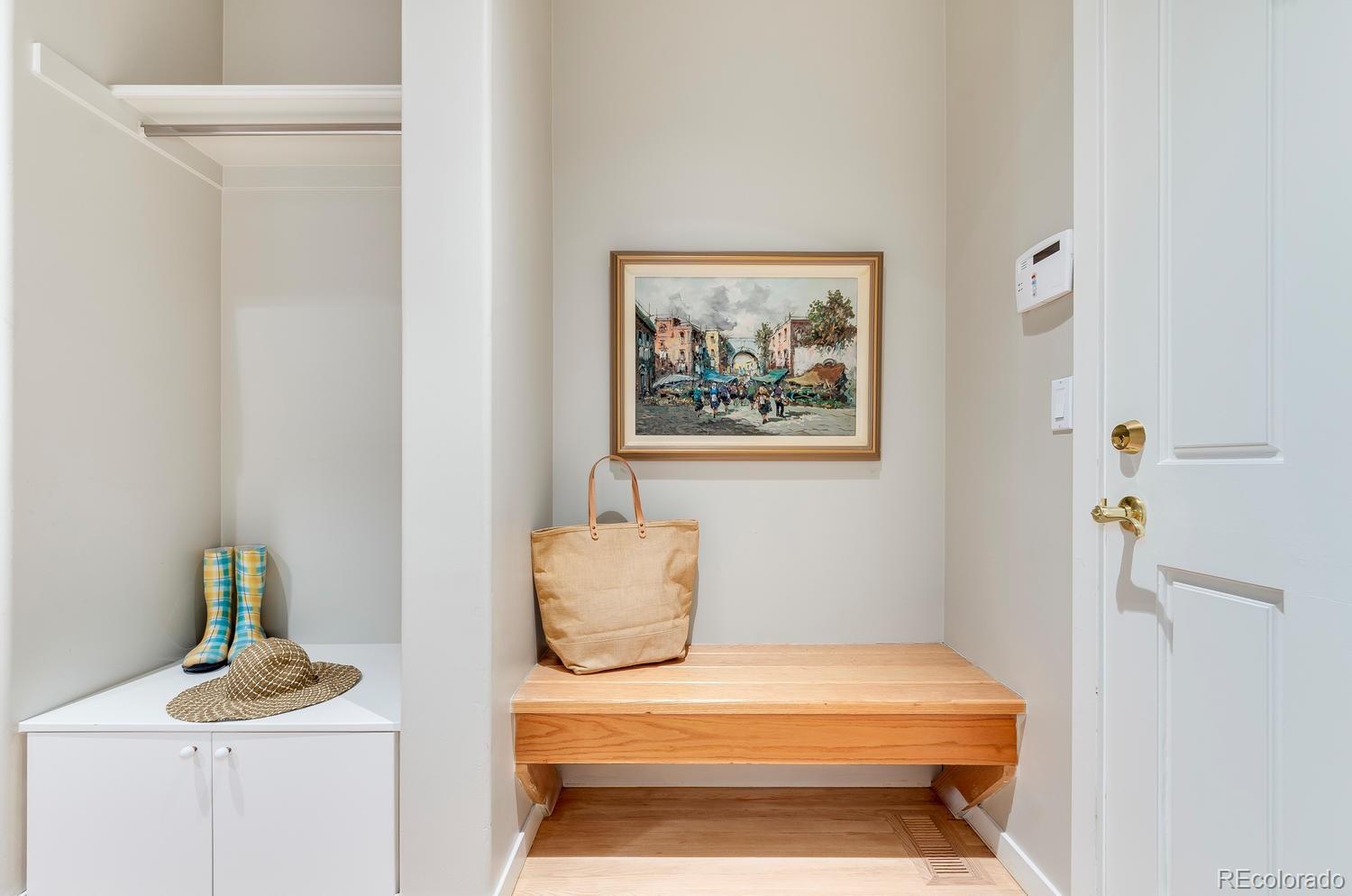 27 Hyde Park Circle Denver, CO 80209 - Photo 16 of 40 a bathroom with a sink and a mirror