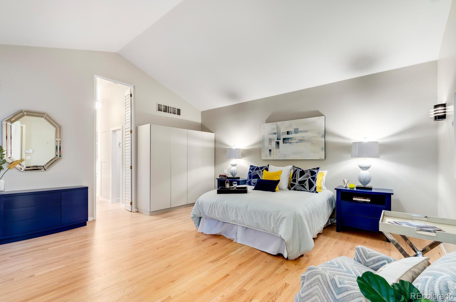 27 Hyde Park Circle Denver, CO 80209 - Photo 17 of 40 a bedroom with furniture and wooden floor