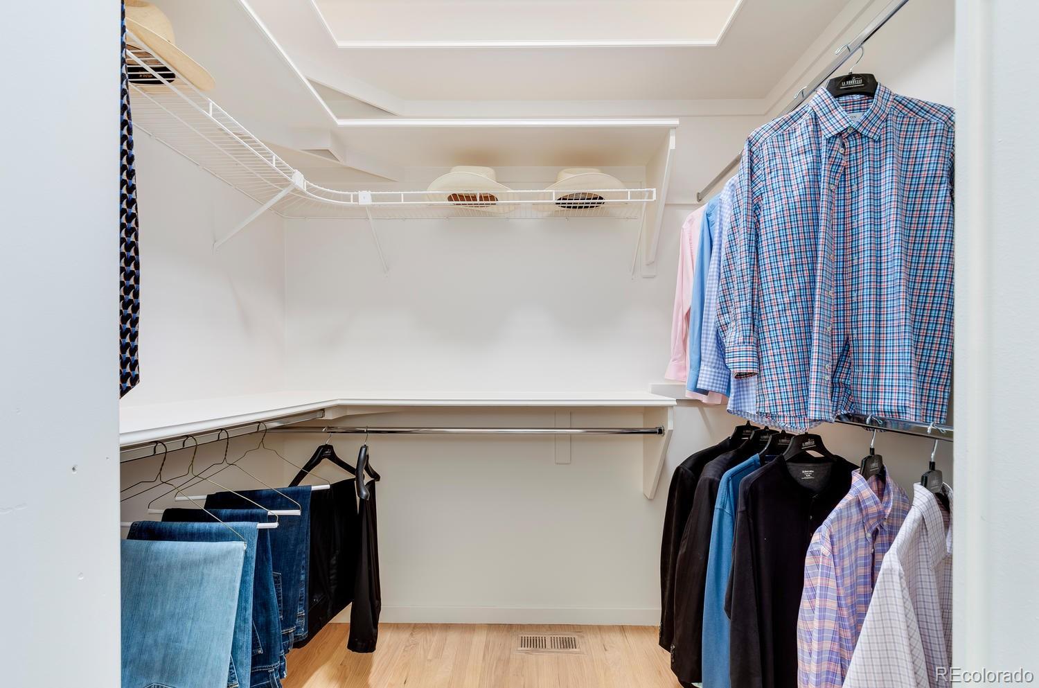 27 Hyde Park Circle Denver, CO 80209 - Photo 21 of 40 a view of walk in closet with clothes and shoes