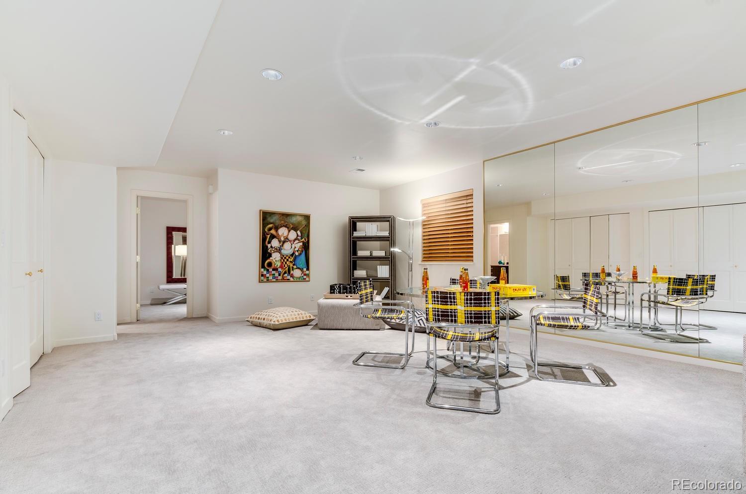 27 Hyde Park Circle Denver, CO 80209 - Photo 33 of 40 a living room with furniture and white walls