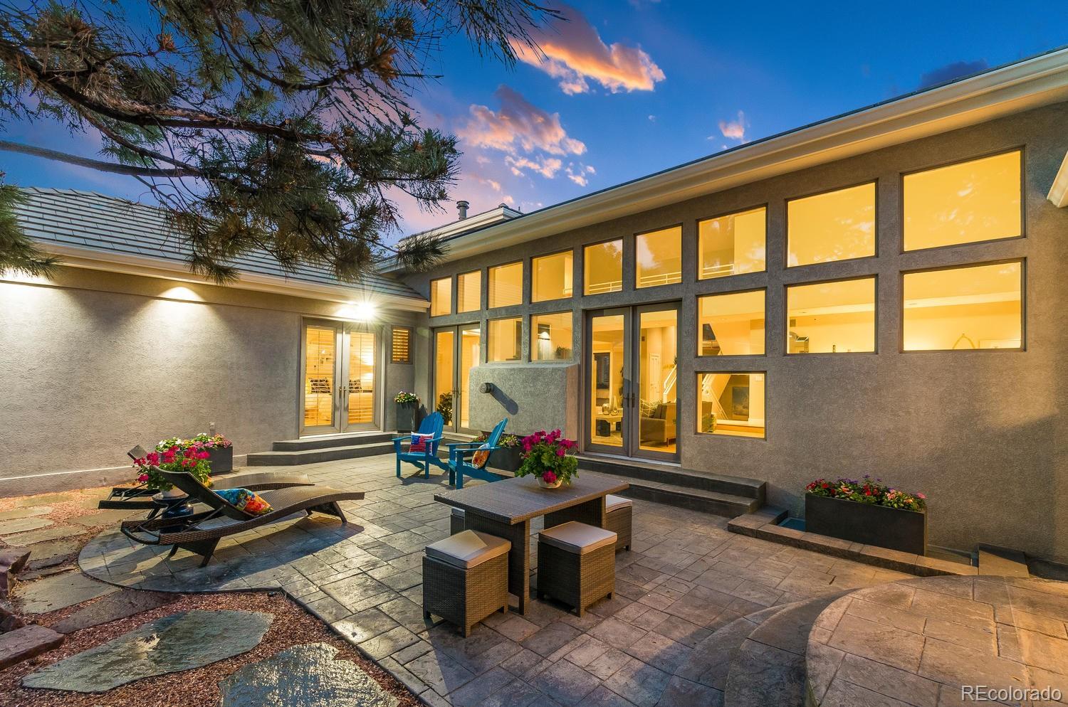 27 Hyde Park Circle Denver, CO 80209 - Photo 37 of 40 a living room with furniture and flowers
