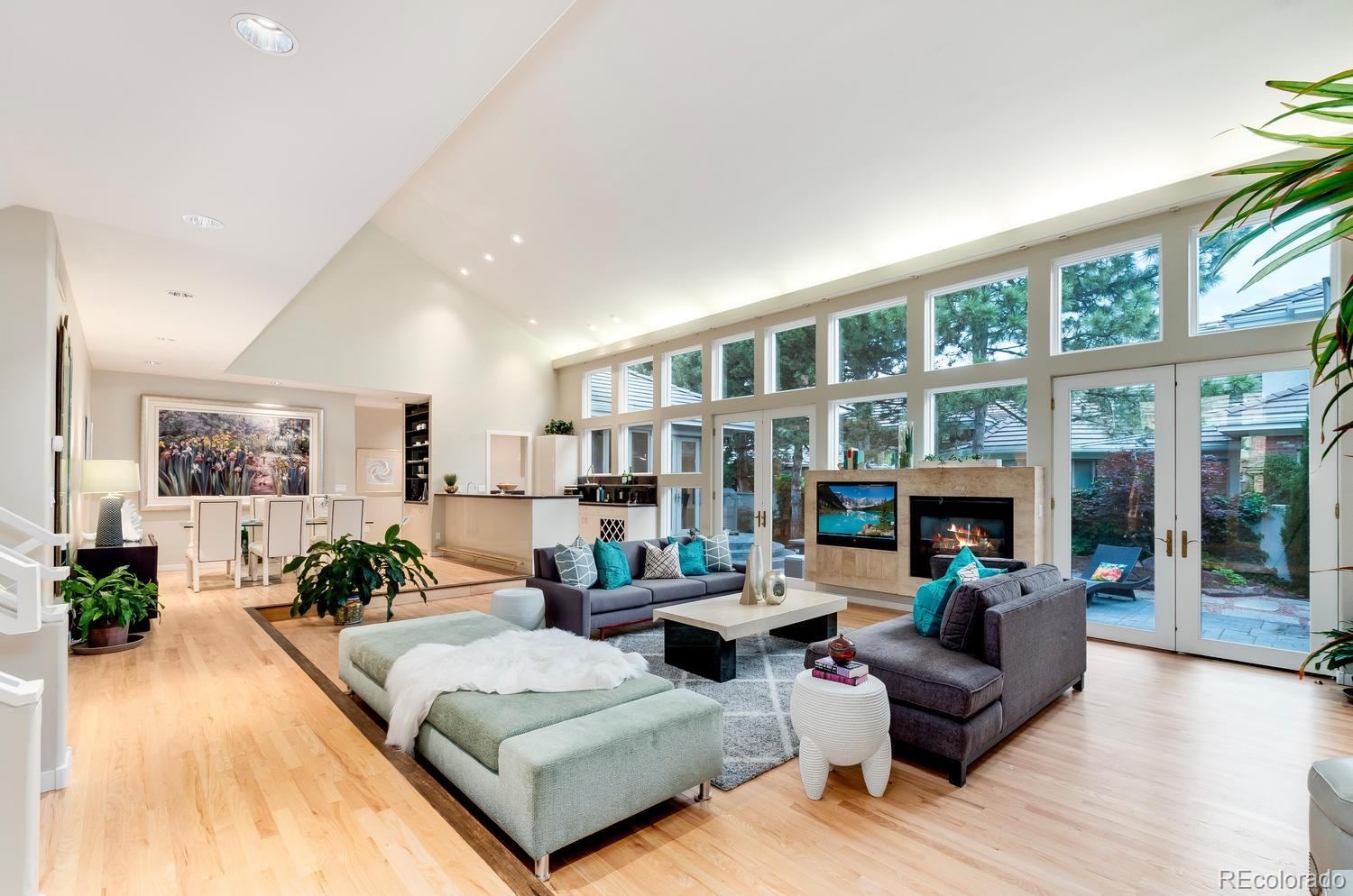 27 Hyde Park Circle Denver, CO 80209 - Photo 5 of 40 a living room with furniture and a large window