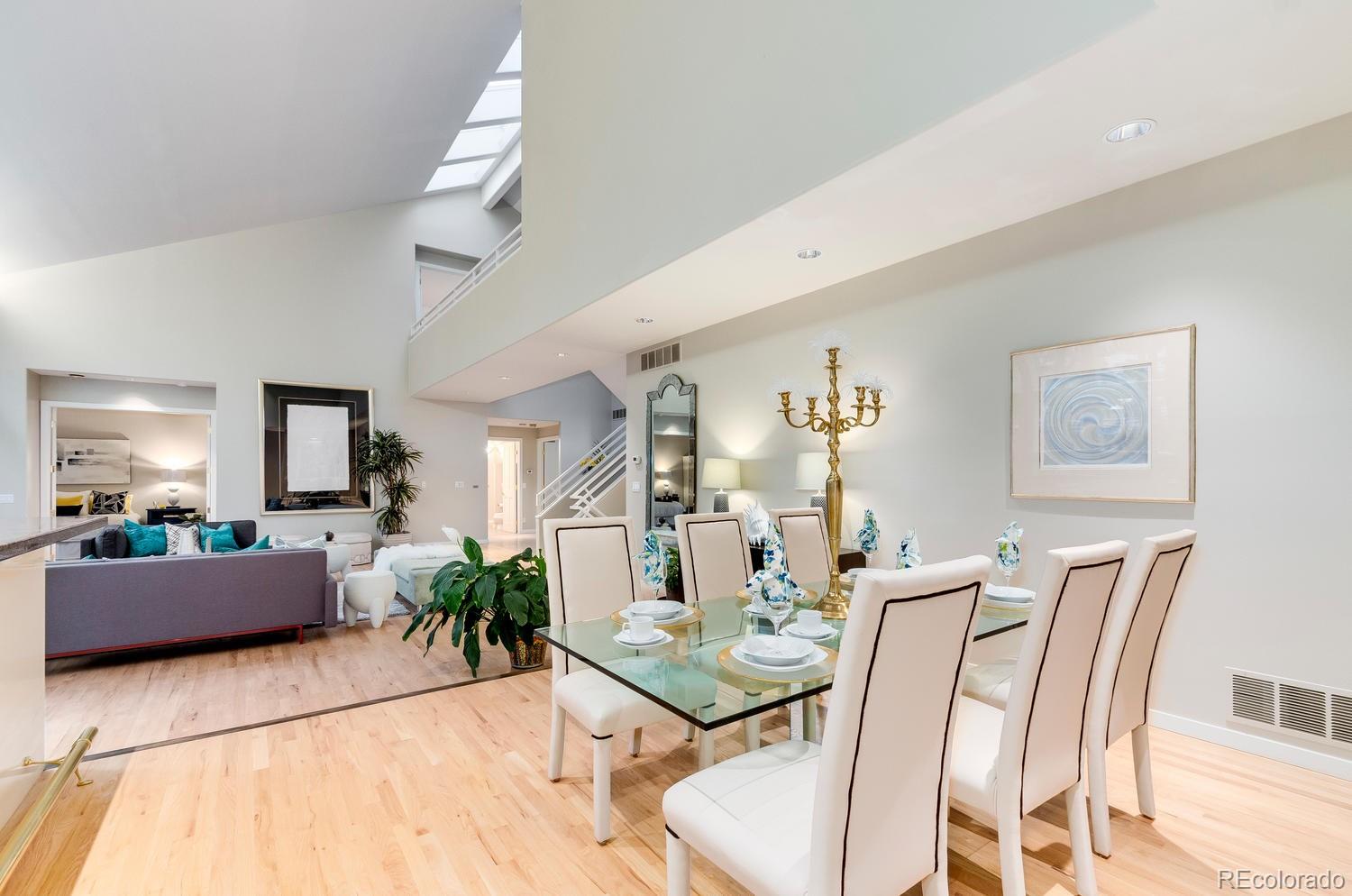 27 Hyde Park Circle Denver, CO 80209 - Photo 8 of 40 a view of a dining room with furniture